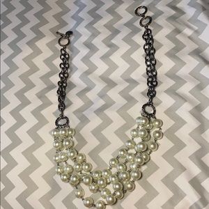 Layered pearl necklace on a silver chain